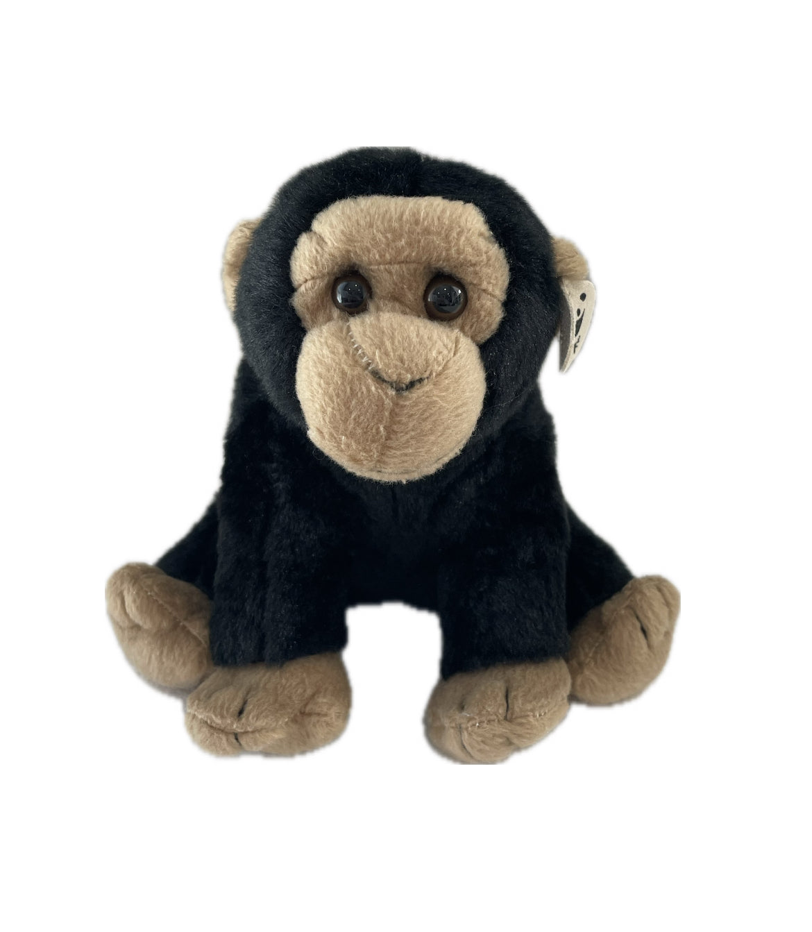 Plush monkey toy with black fur and brown face on a white background wwf chimp