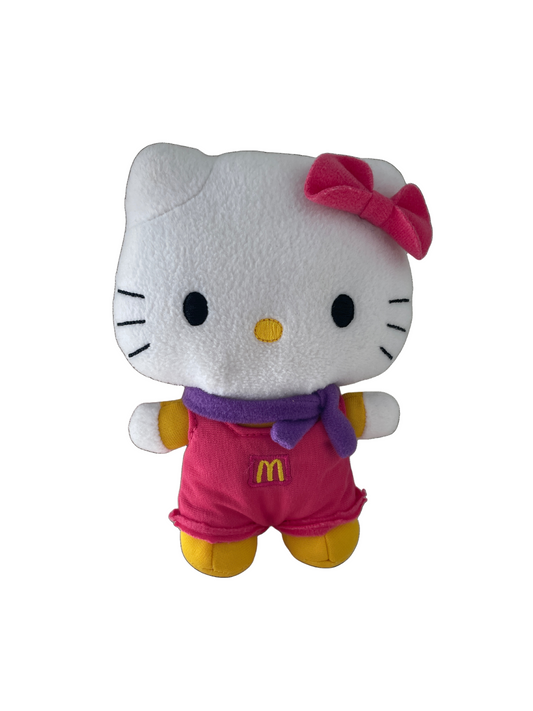 Plush toy resembling a well-known character with a pink bow and outfit on a white background hello kitty mcdonalds